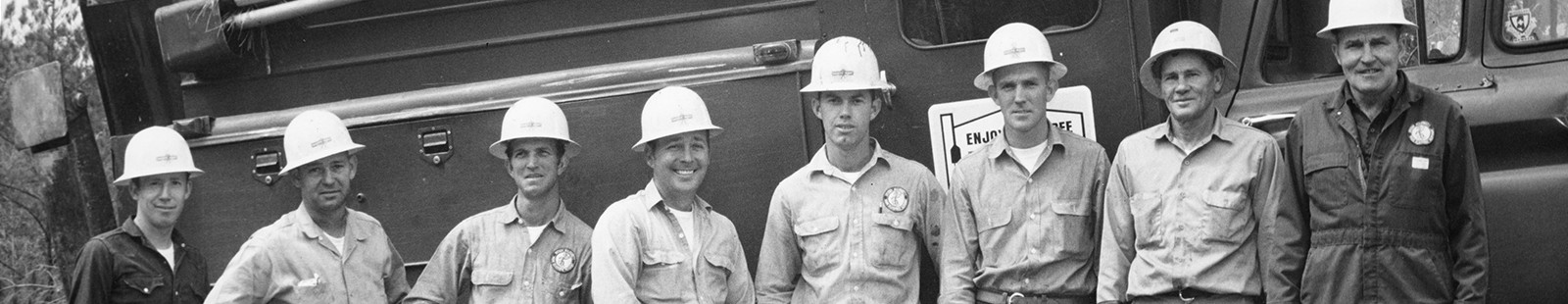 Black and white picture of men in hard hats