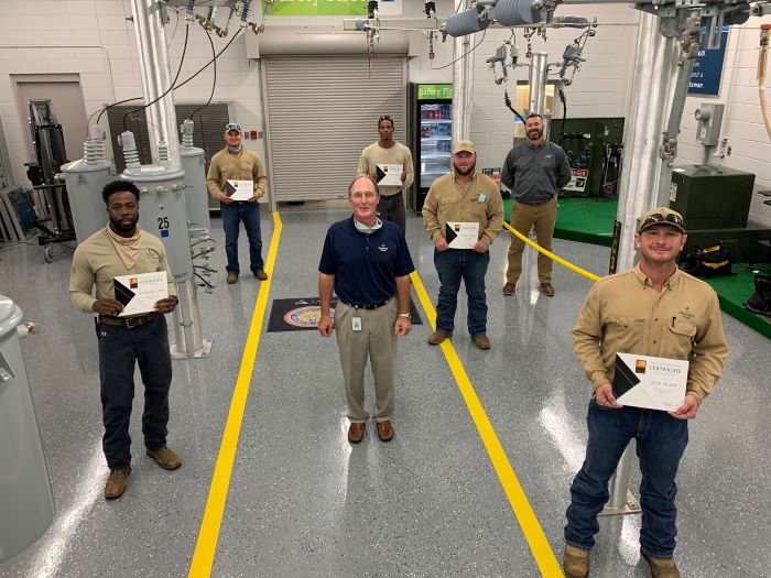 First group of apprentice linemen to complete the National Utility Industry Training Fund program